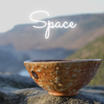 bowl on a rock